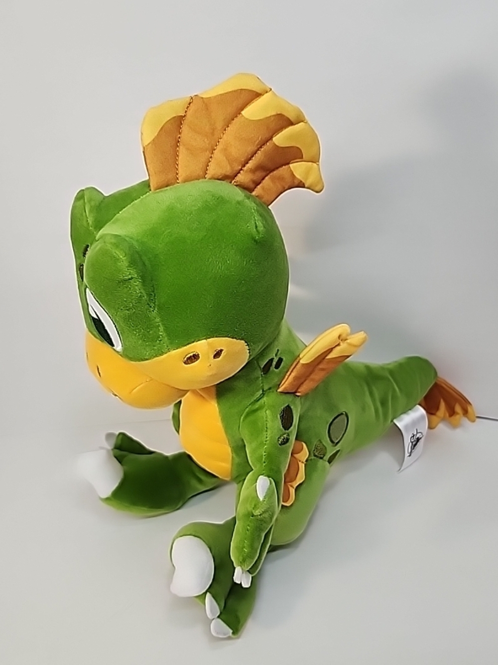 Disney Animal Kingdom Green Plush Dragon with Orange Tail Accents